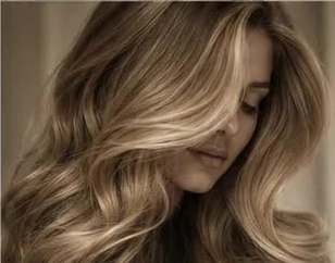 Styled blowout waves in soft natural light